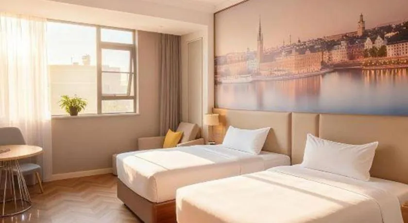 Bed in Vienna Hotel Jiangsu Dongtai Wanghai West Road