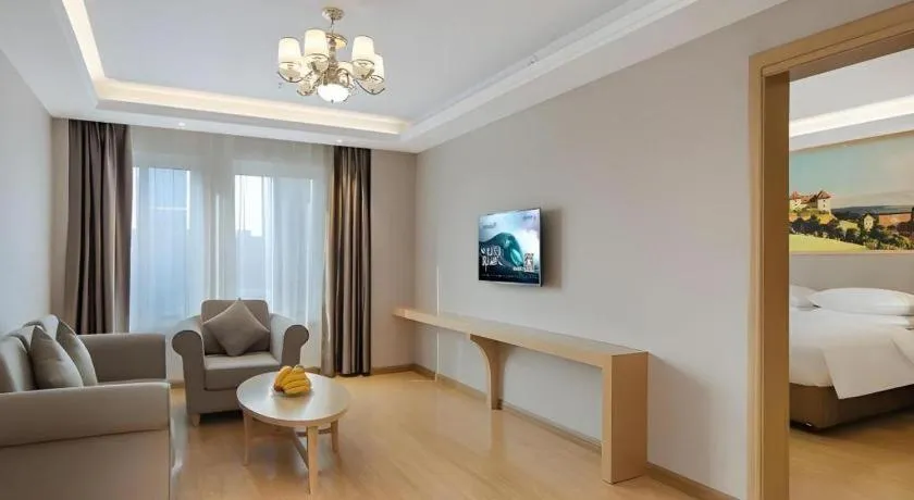 Bed in Vienna Hotel Jiangsu Dongtai Wanghai West Road