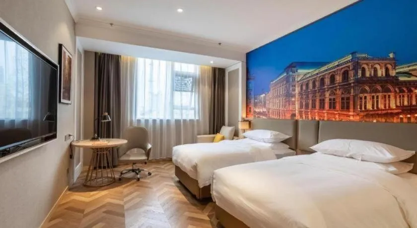 Bed in Vienna Hotel Jiangsu Dongtai Wanghai West Road