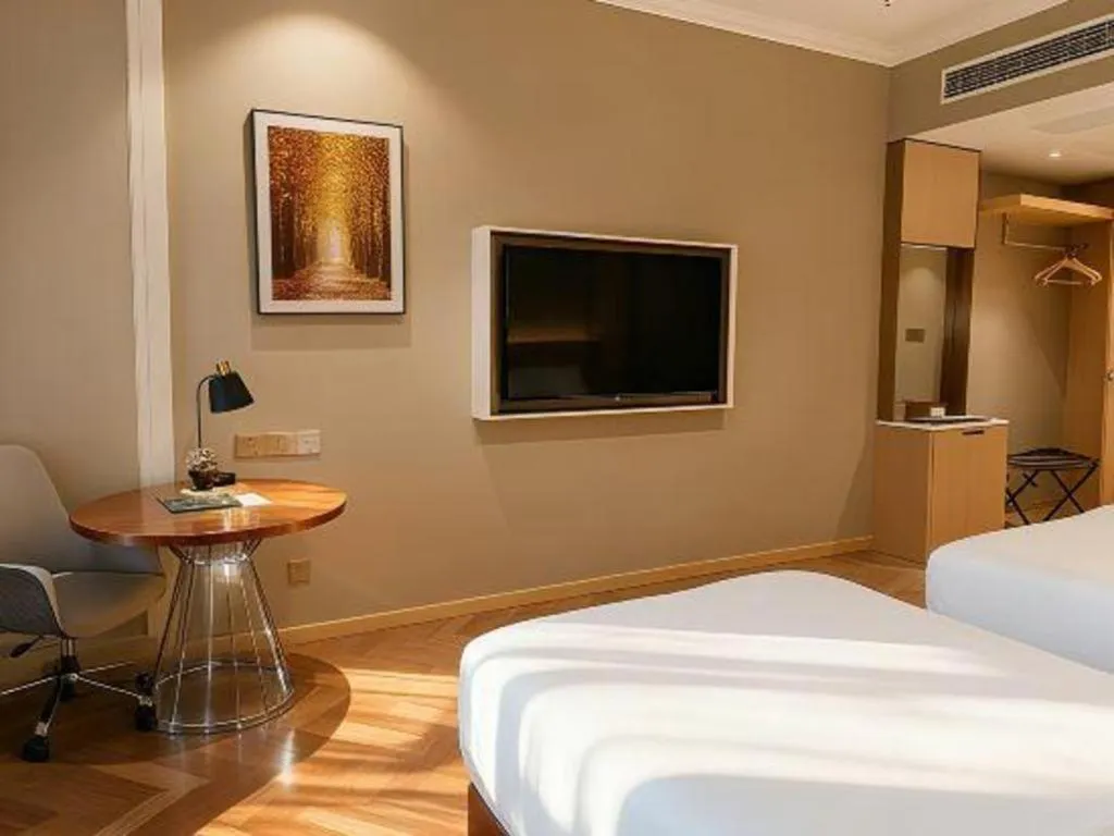 Bed in Vienna Hotel Jiangsu Dongtai Wanghai West Road