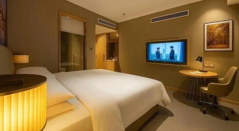 Bed in Vienna Hotel Jiangsu Dongtai Wanghai West Road