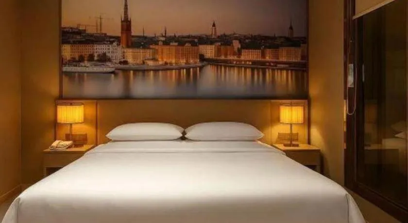 Bed in Vienna Hotel Jiangsu Dongtai Wanghai West Road