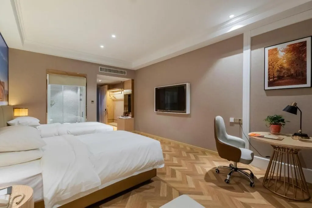 Bed in Vienna Hotel Jiangsu Dongtai Wanghai West Road