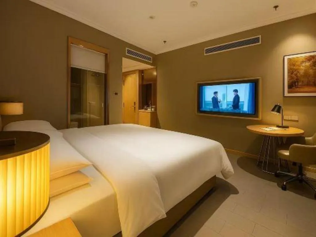 Bed in Vienna Hotel Jiangsu Dongtai Wanghai West Road