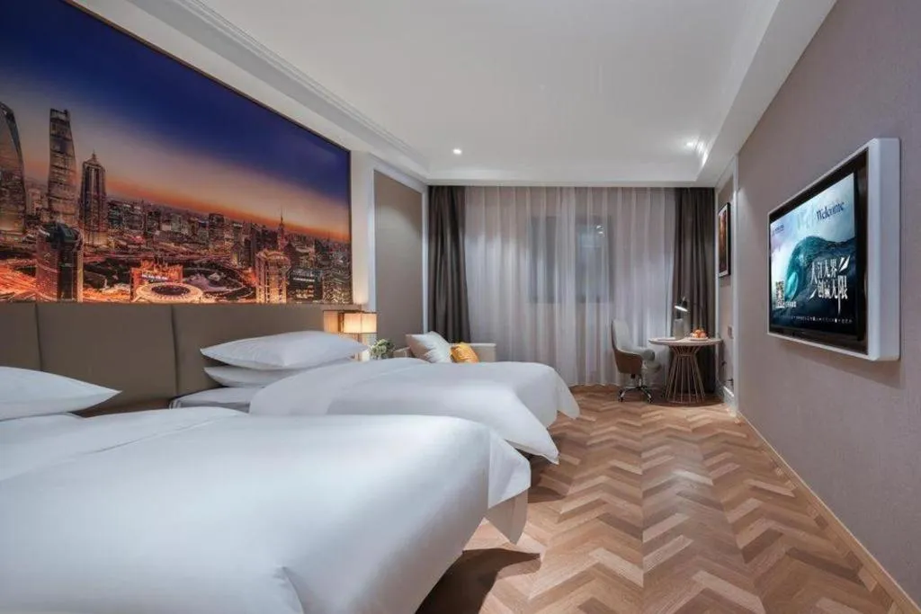 Bed in Vienna Hotel Jiangsu Dongtai Wanghai West Road