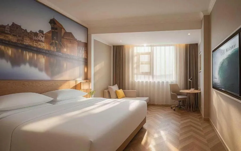 Bed in Vienna Hotel Jiangsu Dongtai Wanghai West Road
