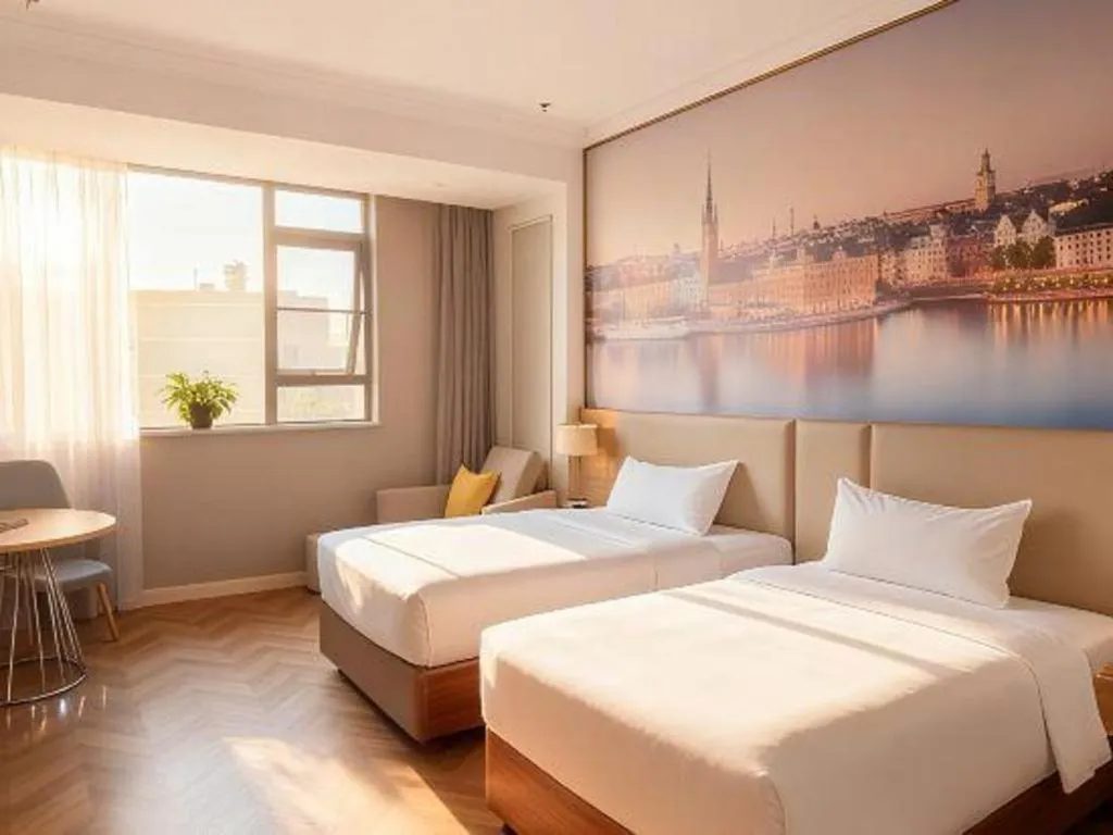 Bed in Vienna Hotel Jiangsu Dongtai Wanghai West Road