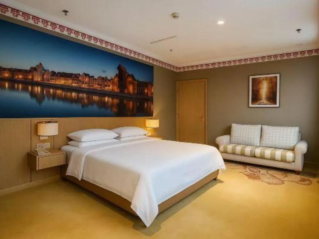 Bed in Vienna Hotel Jiangsu Dongtai Wanghai West Road