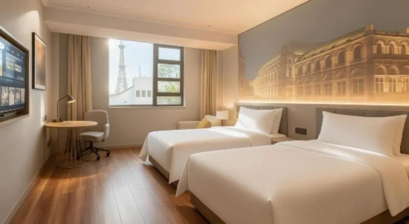 Bed in Vienna Hotel Jiangsu Dongtai Wanghai West Road