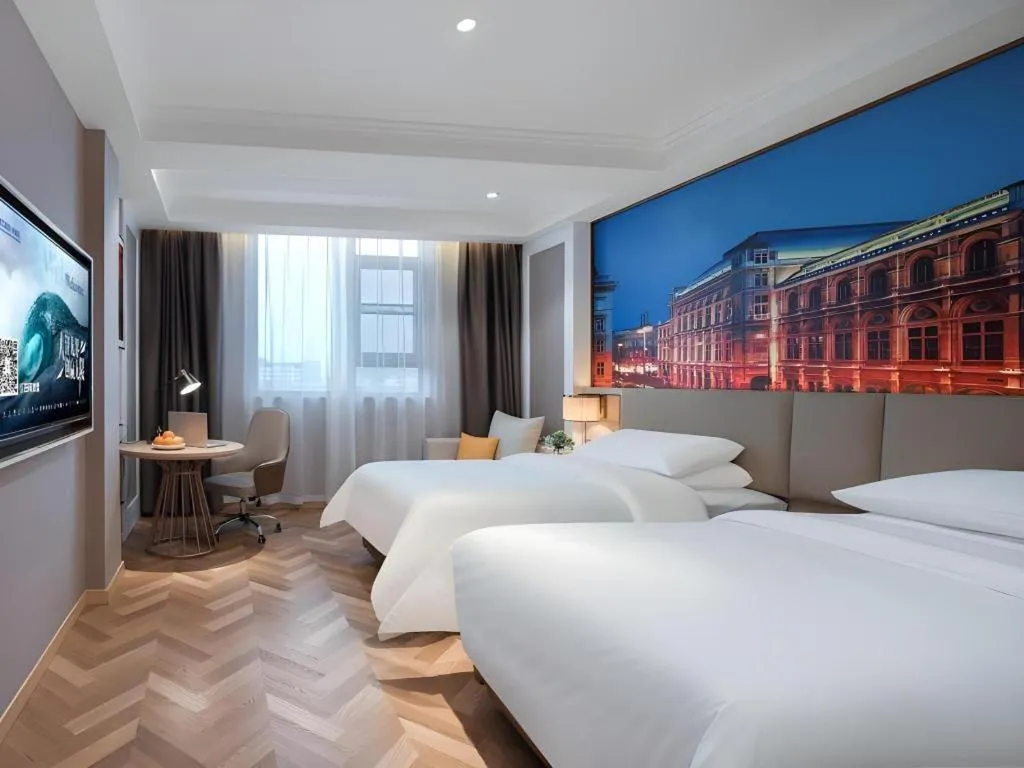 Bed in Vienna Hotel Jiangsu Dongtai Wanghai West Road