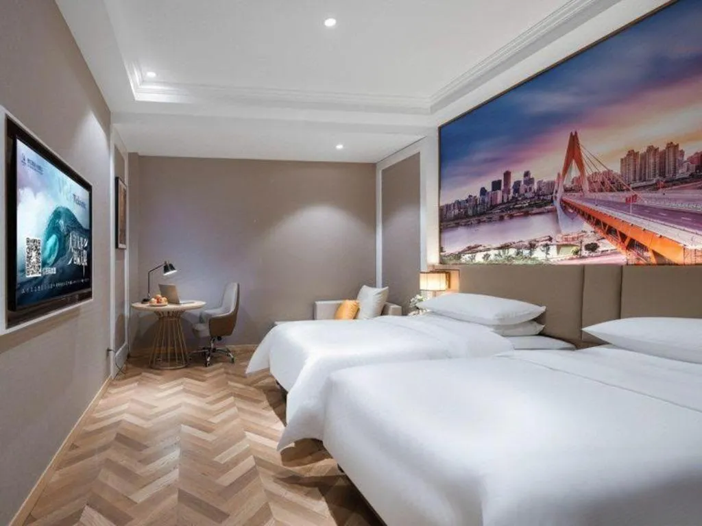 Bed in Vienna Hotel Jiangsu Dongtai Wanghai West Road