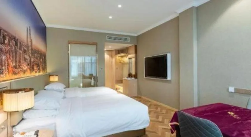Bed in Vienna Hotel Jiangsu Dongtai Wanghai West Road