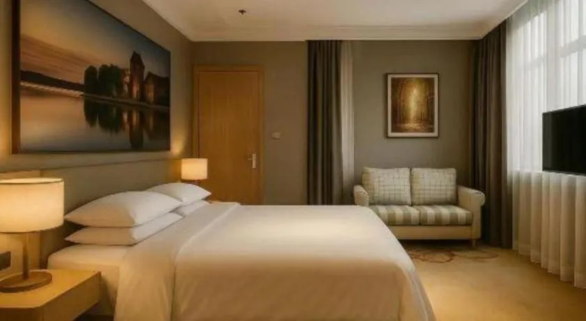 Bed in Vienna Hotel Jiangsu Dongtai Wanghai West Road