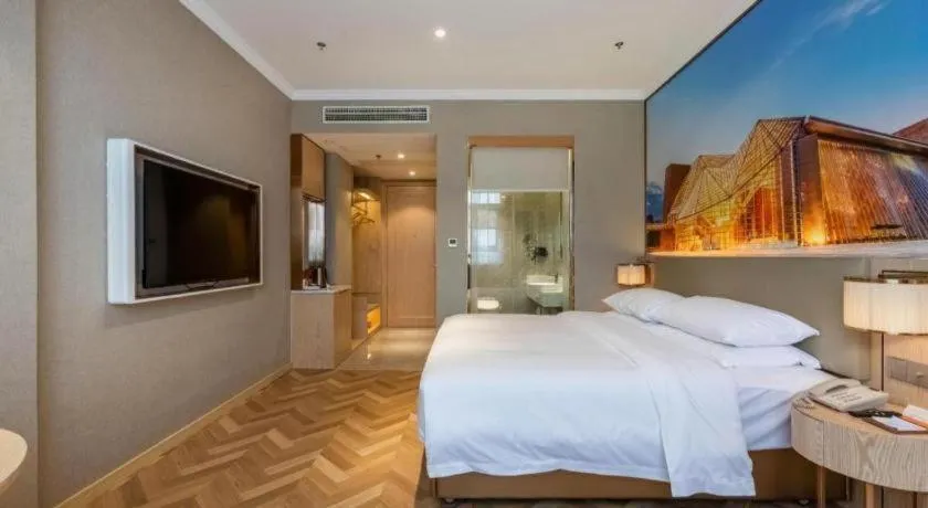 Bed in Vienna Hotel Jiangsu Dongtai Wanghai West Road