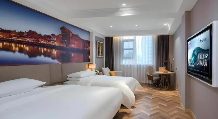 Bed in Vienna Hotel Jiangsu Dongtai Wanghai West Road