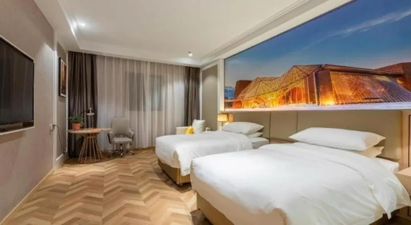 Bed in Vienna Hotel Jiangsu Dongtai Wanghai West Road