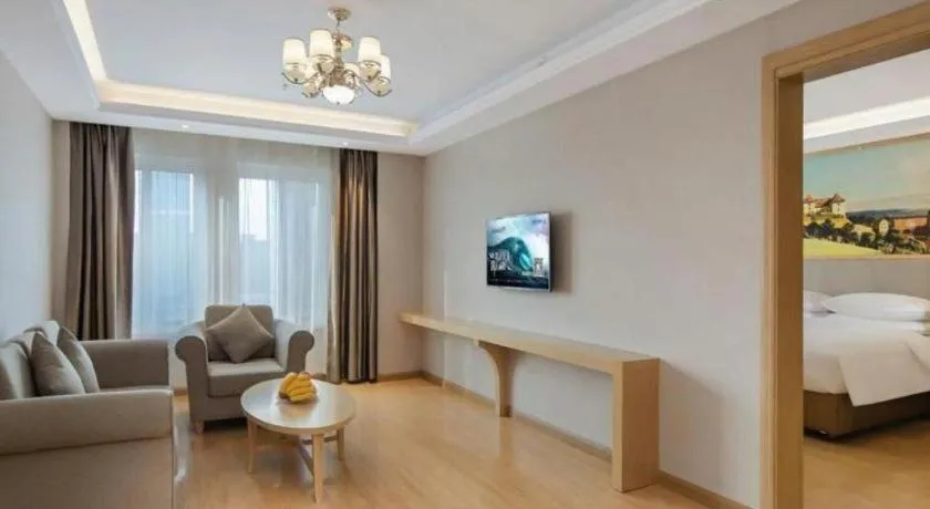 Bed in Vienna Hotel Jiangsu Dongtai Wanghai West Road