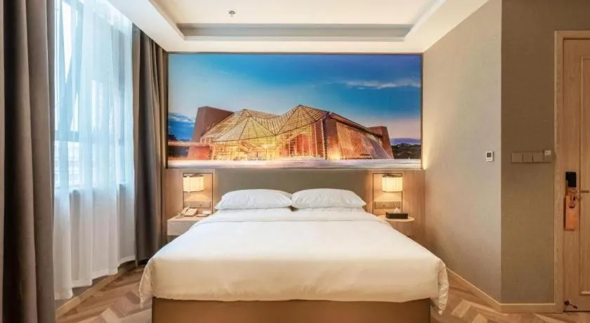 Bed in Vienna Hotel Jiangsu Dongtai Wanghai West Road