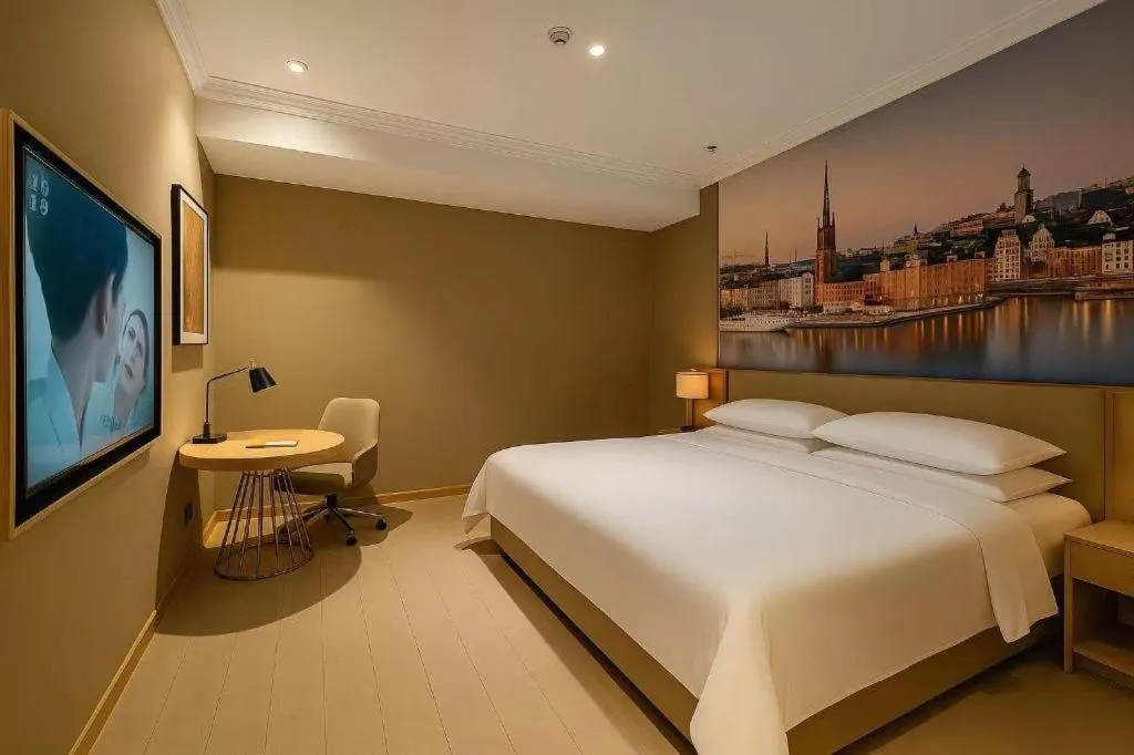 Bed in Vienna Hotel Jiangsu Dongtai Wanghai West Road