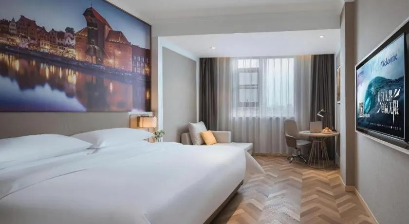 Bed in Vienna Hotel Jiangsu Dongtai Wanghai West Road