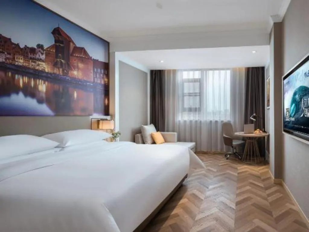 Bed in Vienna Hotel Jiangsu Dongtai Wanghai West Road