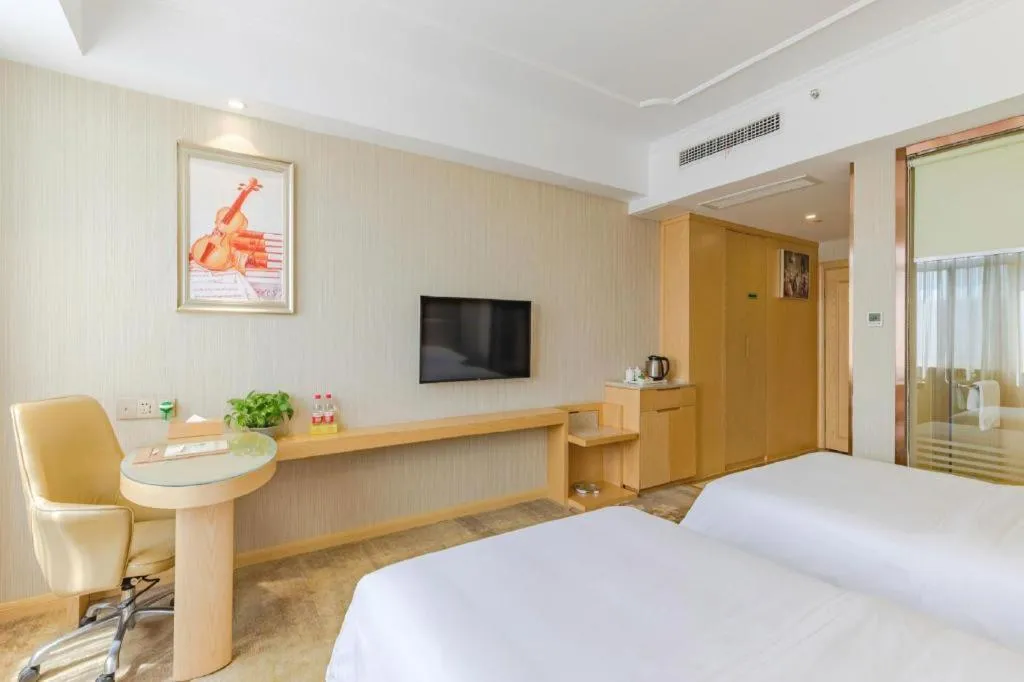 Bed in Vienna Hotel Anhui Huainan Shou County South Gate of Ancient Town Jinrun Central City