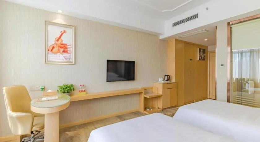 Bed in Vienna Hotel Anhui Huainan Shou County South Gate of Ancient Town Jinrun Central City