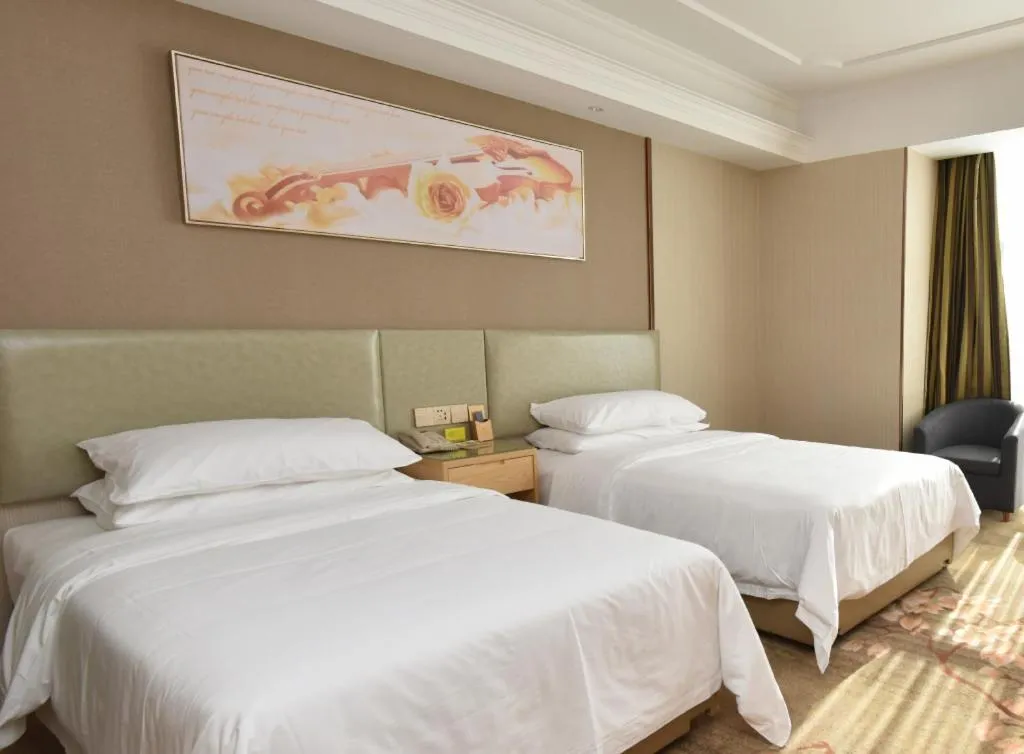 Bed in Vienna Hotel Anhui Huainan Shou County South Gate of Ancient Town Jinrun Central City