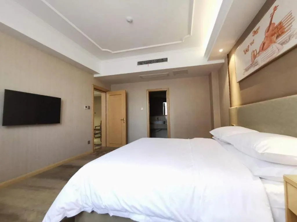 Bed in Vienna Hotel Anhui Huainan Shou County South Gate of Ancient Town Jinrun Central City