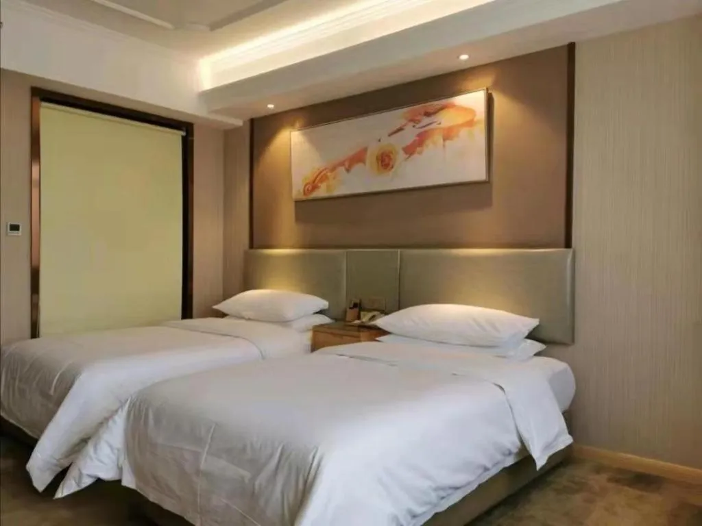 Bed in Vienna Hotel Anhui Huainan Shou County South Gate of Ancient Town Jinrun Central City
