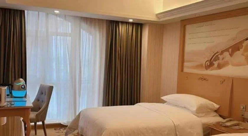 Bed in Vienna Hotel Guangdong Zhongshan Caihong Avenue