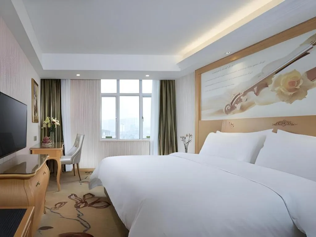 Bed in Vienna Hotel Guangdong Zhongshan Caihong Avenue