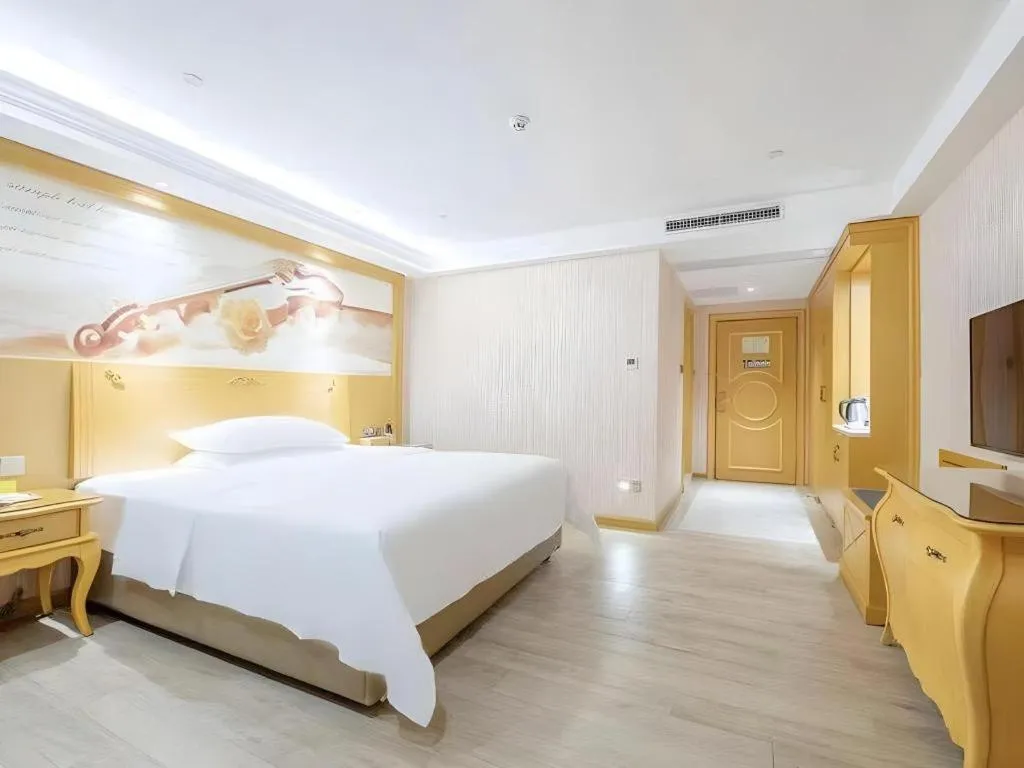 Bed in Vienna Hotel Guangdong Zhongshan Caihong Avenue