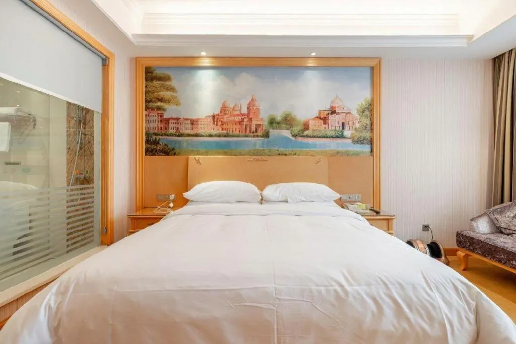 Bed in Vienna Hotel Changsha Yanghu Hanpu