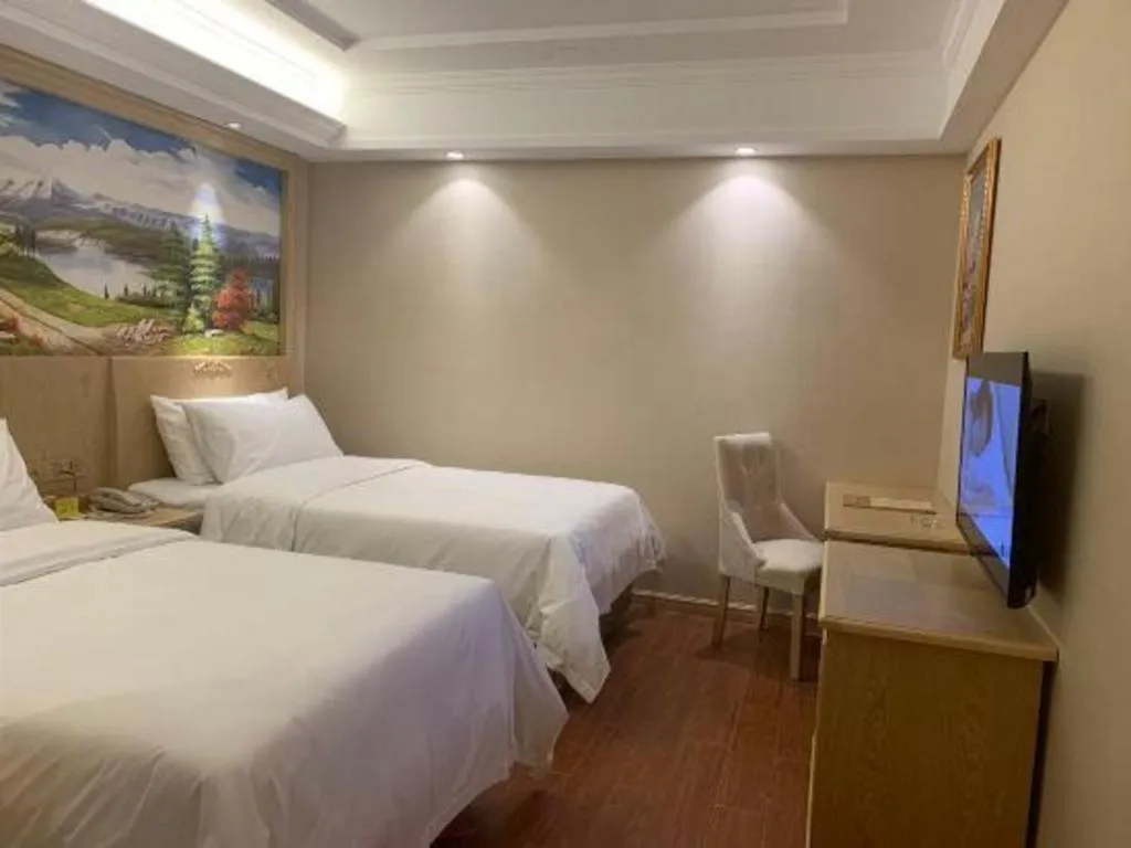 Bed in Vienna Hotel Shenzhen Window of the World Qiaochengdong Metro Station