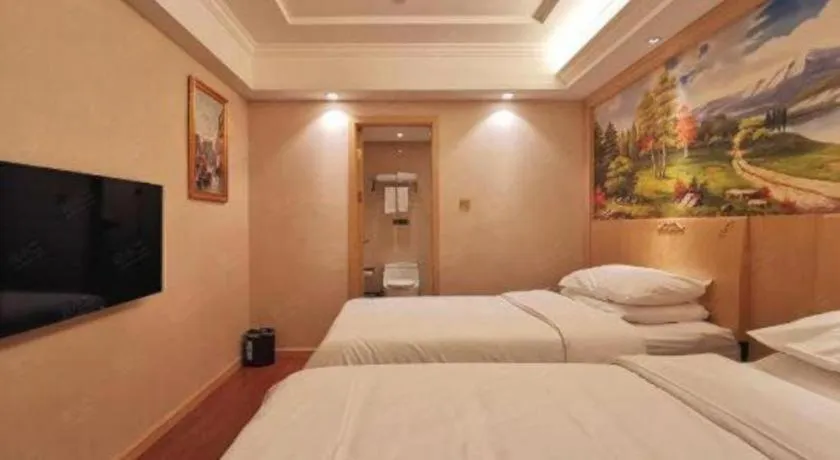 Bed in Vienna Hotel Shenzhen Window of the World Qiaochengdong Metro Station