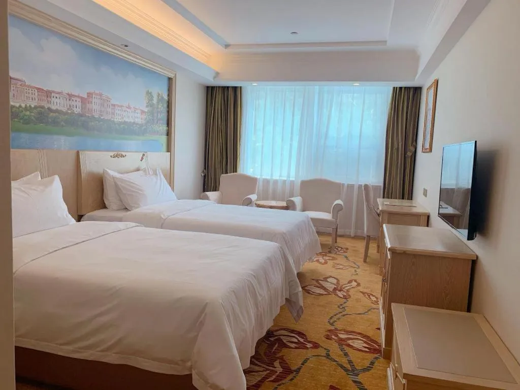 Bed in Vienna Hotel Shenzhen Window of the World Qiaochengdong Metro Station