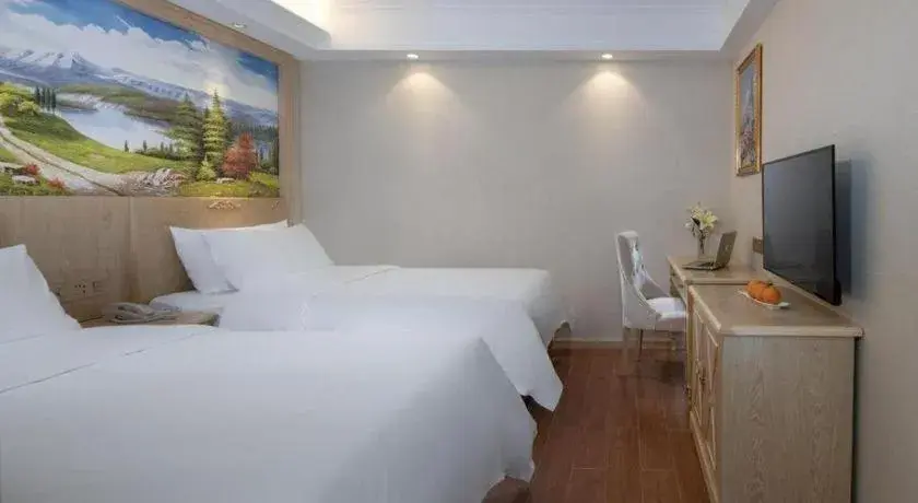 Bed in Vienna Hotel Shenzhen Window of the World Qiaochengdong Metro Station Bed in Vienna Hotel Shenzhen Window of the World Qiaochengdong Metro Station