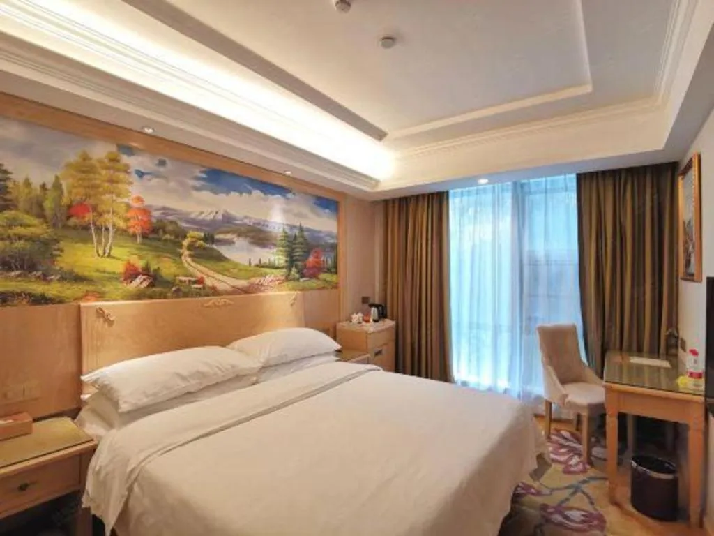 Bed in Vienna Hotel Shenzhen Window of the World Qiaochengdong Metro Station