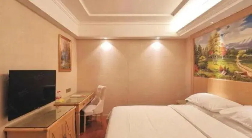 Bed in Vienna Hotel Shenzhen Window of the World Qiaochengdong Metro Station Bed in Vienna Hotel Shenzhen Window of the World Qiaochengdong Metro Station