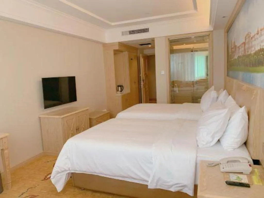 Bed in Vienna Hotel Shenzhen Window of the World Qiaochengdong Metro Station