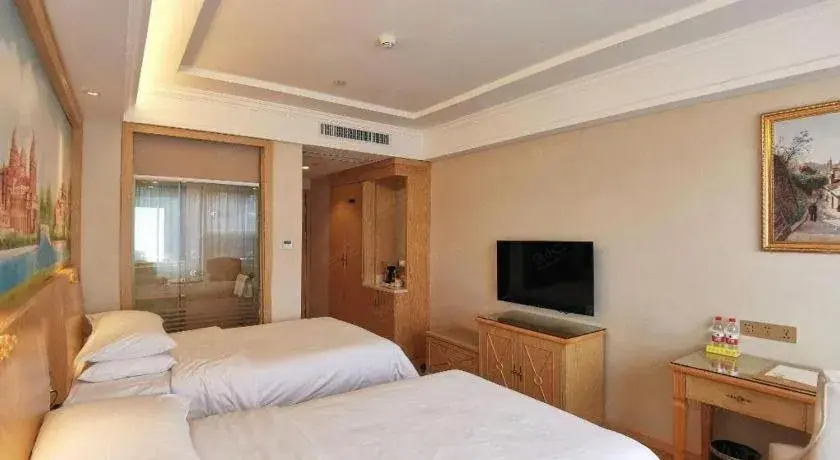 Bed in Vienna Hotel Shenzhen Window of the World Qiaochengdong Metro Station Bed in Vienna Hotel Shenzhen Window of the World Qiaochengdong Metro Station