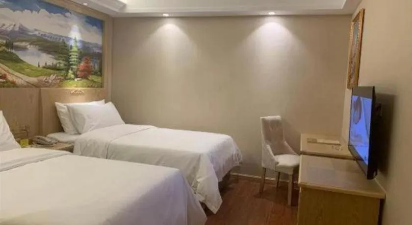 Bed in Vienna Hotel Shenzhen Window of the World Qiaochengdong Metro Station