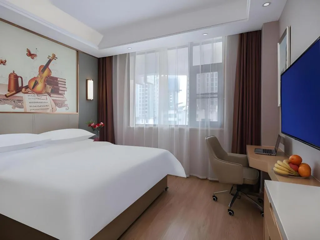 Bed in Vienna Hotel Shaanxi Xianyang Huitong China Square