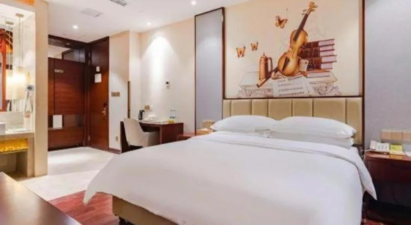 Bed in Venus International Hotel Kunming Baiyun Road Tongde Square