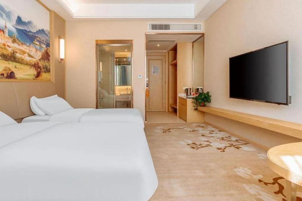 Bed in Vienna Hotel Baoshan Yongchang Road