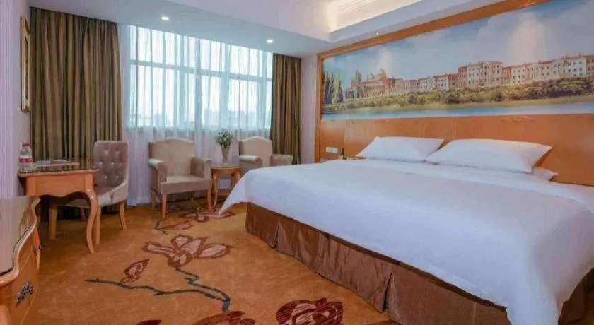 Bed in Vienna Hotel Guangdong Huiyang Qiuchang Yingbin Road