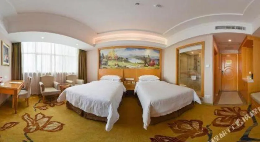 Bed in Vienna Hotel Guangdong Huiyang Qiuchang Yingbin Road