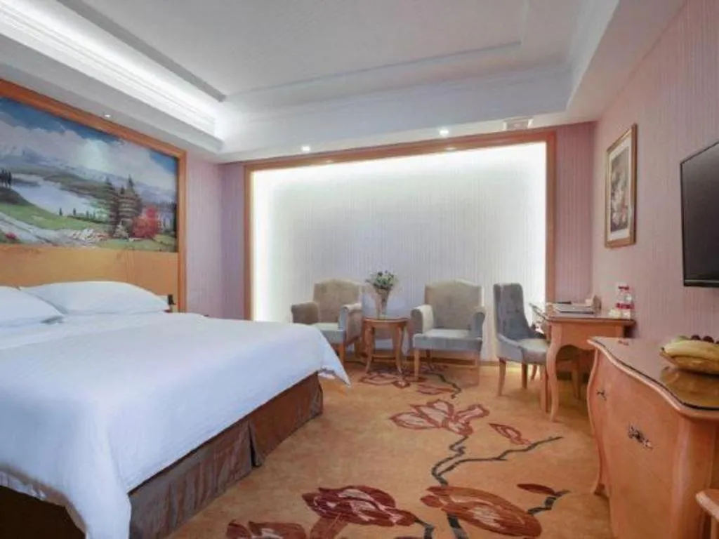 Bed in Vienna Hotel Guangdong Huiyang Qiuchang Yingbin Road