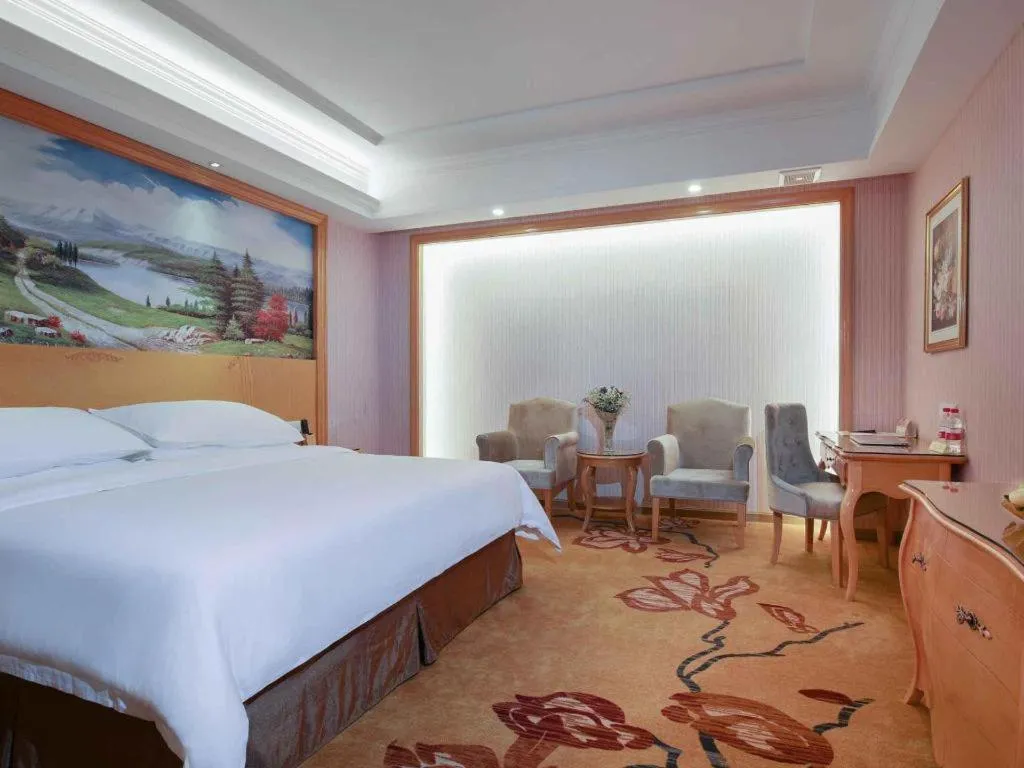 Bed in Vienna Hotel Guangdong Huiyang Qiuchang Yingbin Road
